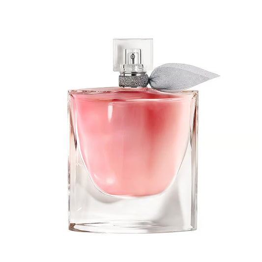 Lancôme La Vie Est Belle EdP damparfym – den ikoniska glasflaskan med ett "kristall-leende" i basen, fylld med en mjuk rosa vätska och prydd med en elegant grå organzarosett runt halsen.