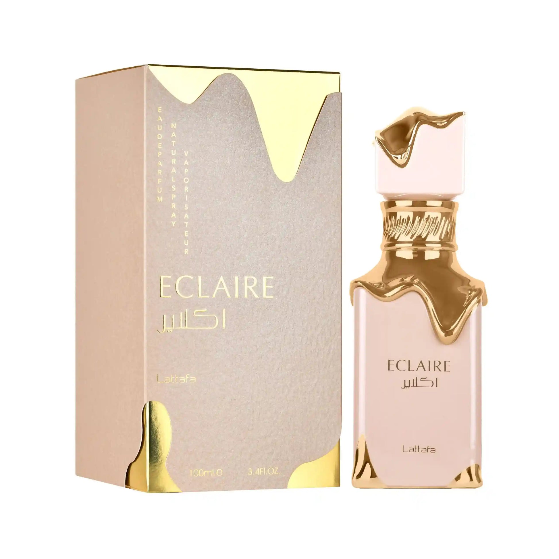 Lattafa Eclaire EdP arabisk parfym – en ljusrosa flaska med iögonfallande detaljer av smält guld som rinner ner över glaset, stående bredvid sin matchande eleganta ask.